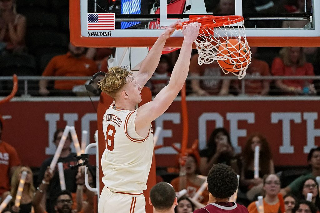 Nov 18, 2025; Austin, Texas, USA; Texas Longhorns center Matas Vokietaitis (8) dunks against the Rider Broncs during the second half at Moody Center. Mandatory Credit: Dustin Safranek-Imagn Images
