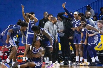 Saint Peter’s Brent Bland (seated) reacts after hitting a shot as he was fouled In the second half of the Blue Hens’ 81-70 win at the Bob Carpenter Center, Nov. 18, 2025. Saint Peter’s pulled within five late in the second half before Delaware reestablished a double-digit lead.