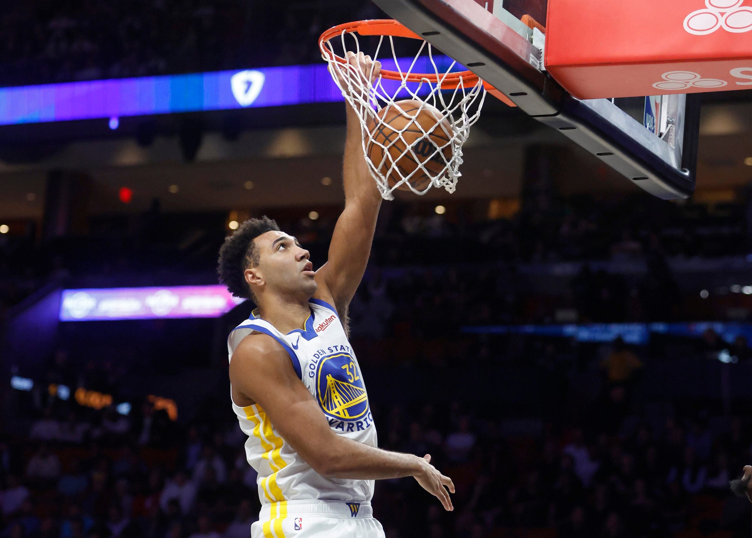 Nov 19, 2025; Miami, Florida, USA; Golden State Warriors forward Trayce Jackson-Davis (32) dunks against the Miami Heat during the first half at Kaseya Center. Mandatory Credit: Rhona Wise-Imagn Images