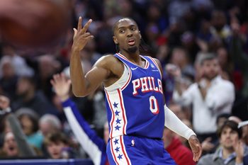Nov 19, 2025; Philadelphia, Pennsylvania, USA; Philadelphia 76ers guard Tyrese Maxey (0) reacts to his three pointer against the Toronto Raptors during the second quarter at Xfinity Mobile Arena. Mandatory Credit: Bill Streicher-Imagn Images
