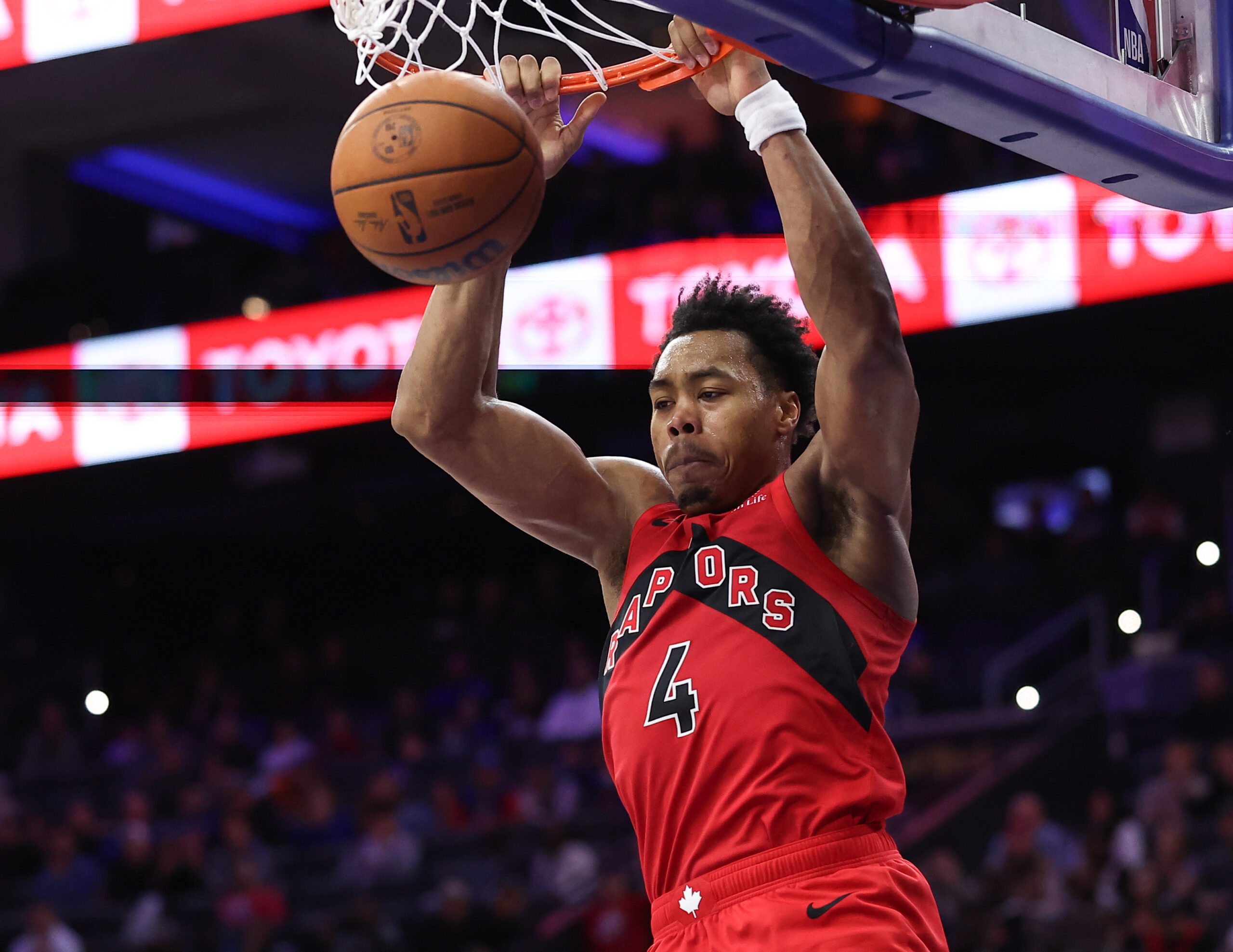 Nov 19, 2025; Philadelphia, Pennsylvania, USA; Toronto Raptors forward Scottie Barnes (4) dunks the ball against the Philadelphia 76ers during the fourth quarter at Xfinity Mobile Arena. Mandatory Credit: Bill Streicher-Imagn Images
