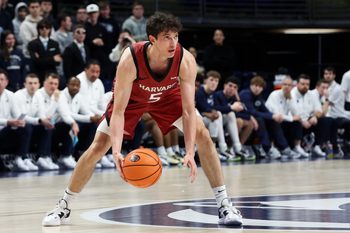Nov 19, 2025; University Park, Pennsylvania, USA; Harvard Crimson guard Ben Eisendrath (5) dribbles the ball during the second half against the Penn State Nittany Lions at Bryce Jordan Center. Mandatory Credit: Matthew O'Haren-Imagn Images
