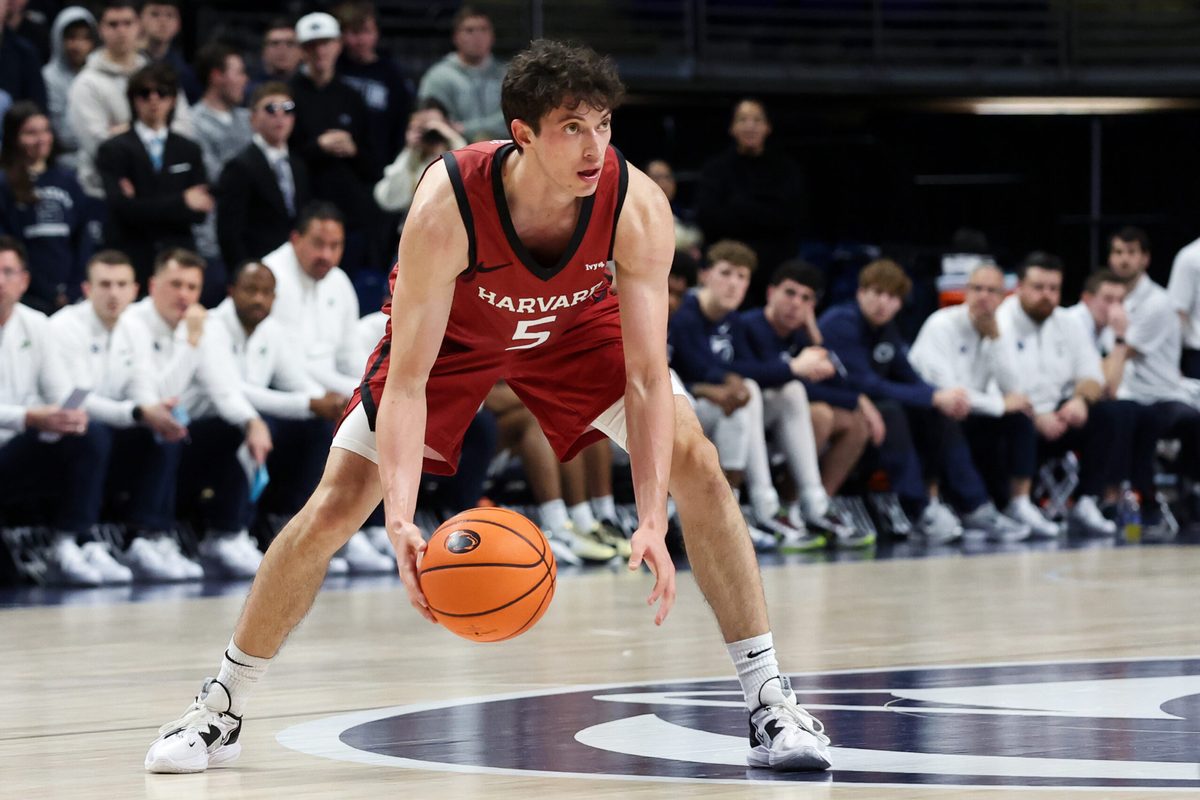Nov 19, 2025; University Park, Pennsylvania, USA; Harvard Crimson guard Ben Eisendrath (5) dribbles the ball during the second half against the Penn State Nittany Lions at Bryce Jordan Center. Mandatory Credit: Matthew O'Haren-Imagn Images