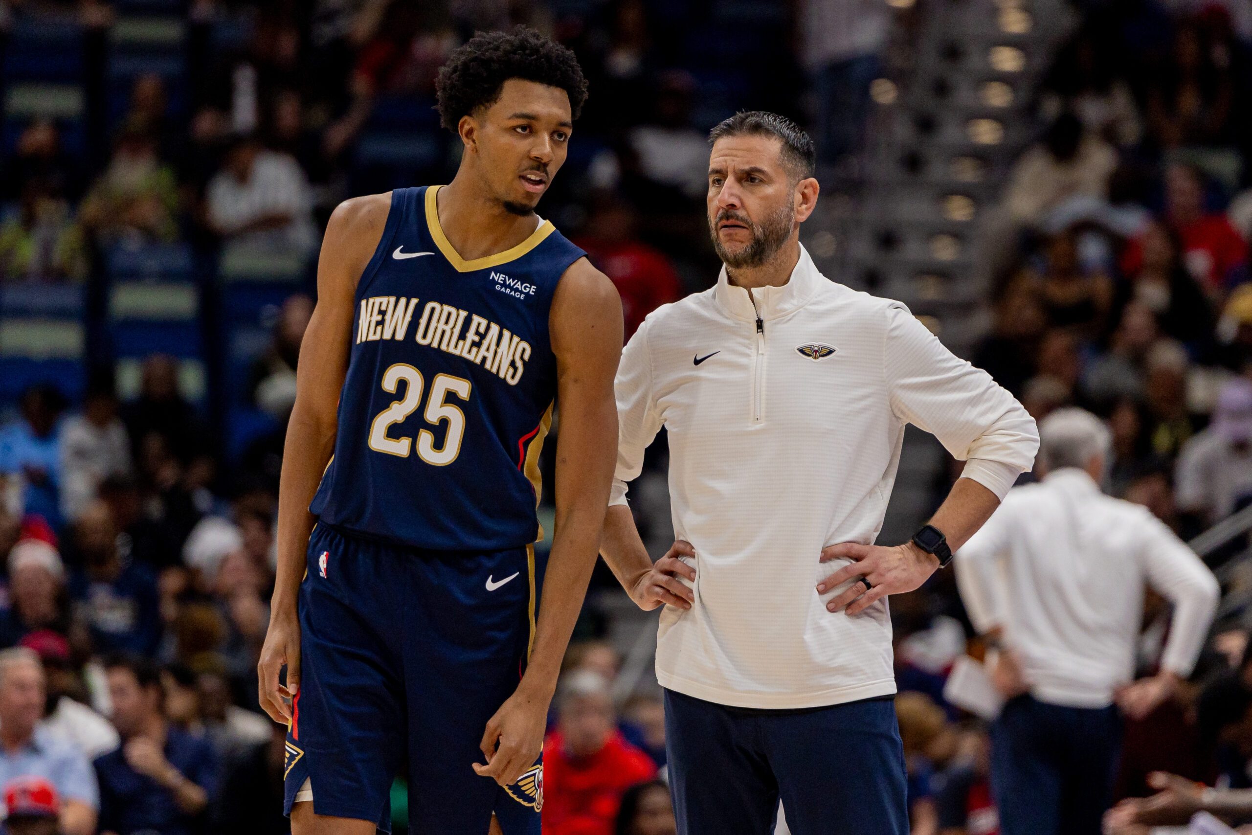 Nov 19, 2025; New Orleans, Louisiana, USA;  New Orleans Pelicans forward Trey Murphy III (25) talks to interim Head Coach James Borrego against the Denver Nuggets during the second half  at Smoothie King Center. Mandatory Credit: Stephen Lew-Imagn Images
