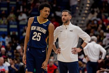 Nov 19, 2025; New Orleans, Louisiana, USA;  New Orleans Pelicans forward Trey Murphy III (25) talks to interim Head Coach James Borrego against the Denver Nuggets during the second half  at Smoothie King Center. Mandatory Credit: Stephen Lew-Imagn Images