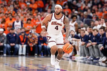 Nov 19, 2025; Chicago, Illinois, USA; Illinois Fighting Illini guard Kylan Boswell (4) brings the ball up court against the Alabama Crimson Tide during the first half at United Center. Mandatory Credit: Kamil Krzaczynski-Imagn Images
