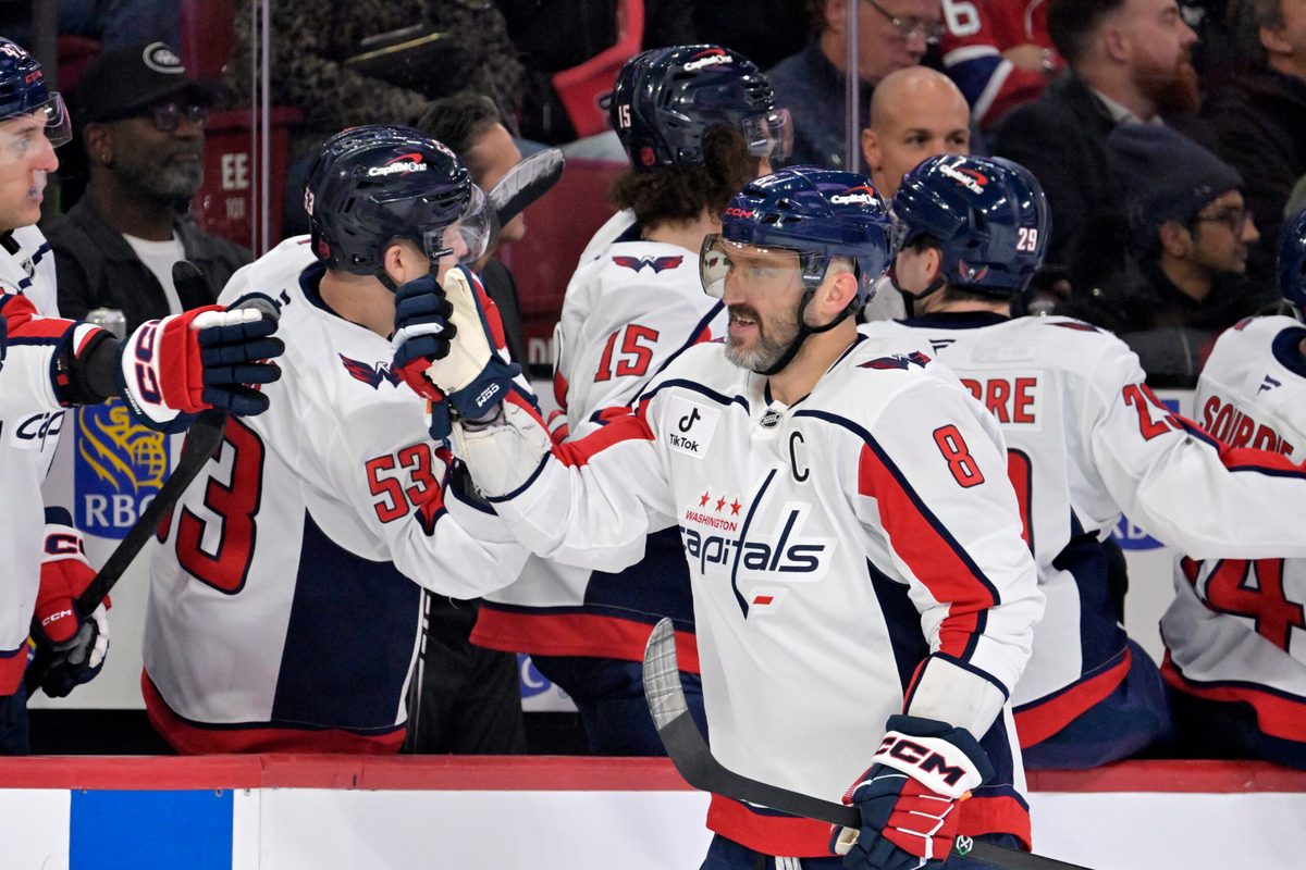 Nov 20, 2025; Montreal, Quebec, CAN; Washington Capitals forward Alex Ovechkin (8) celebrates with teammates after scoring a goal against the Montreal Canadiens  during the third period at the Bell Centre. Mandatory Credit: Eric Bolte-Imagn Images