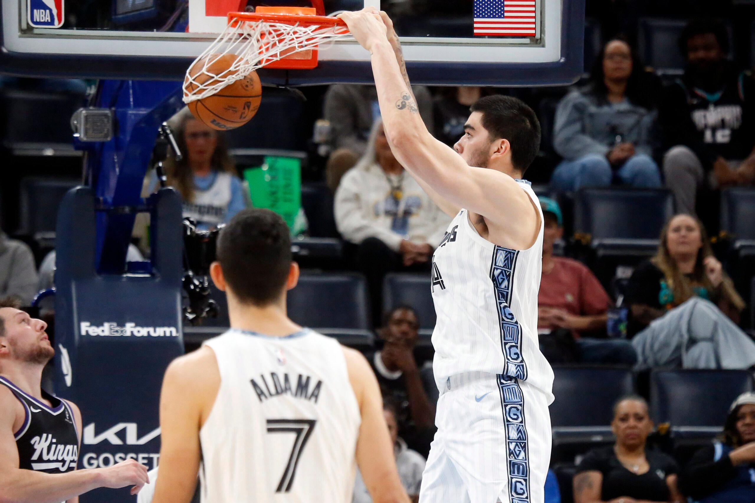 Nov 20, 2025; Memphis, Tennessee, USA; Memphis Grizzlies center Zach Edey (14) dunks during the second quarter against the Sacramento Kings at FedExForum. Mandatory Credit: Petre Thomas-Imagn Images