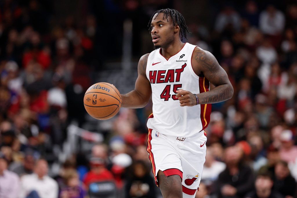 Nov 21, 2025; Chicago, Illinois, USA; Miami Heat guard Davion Mitchell (45) brings the ball up court against the Chicago Bulls during the second half at United Center. Mandatory Credit: Kamil Krzaczynski-Imagn Images