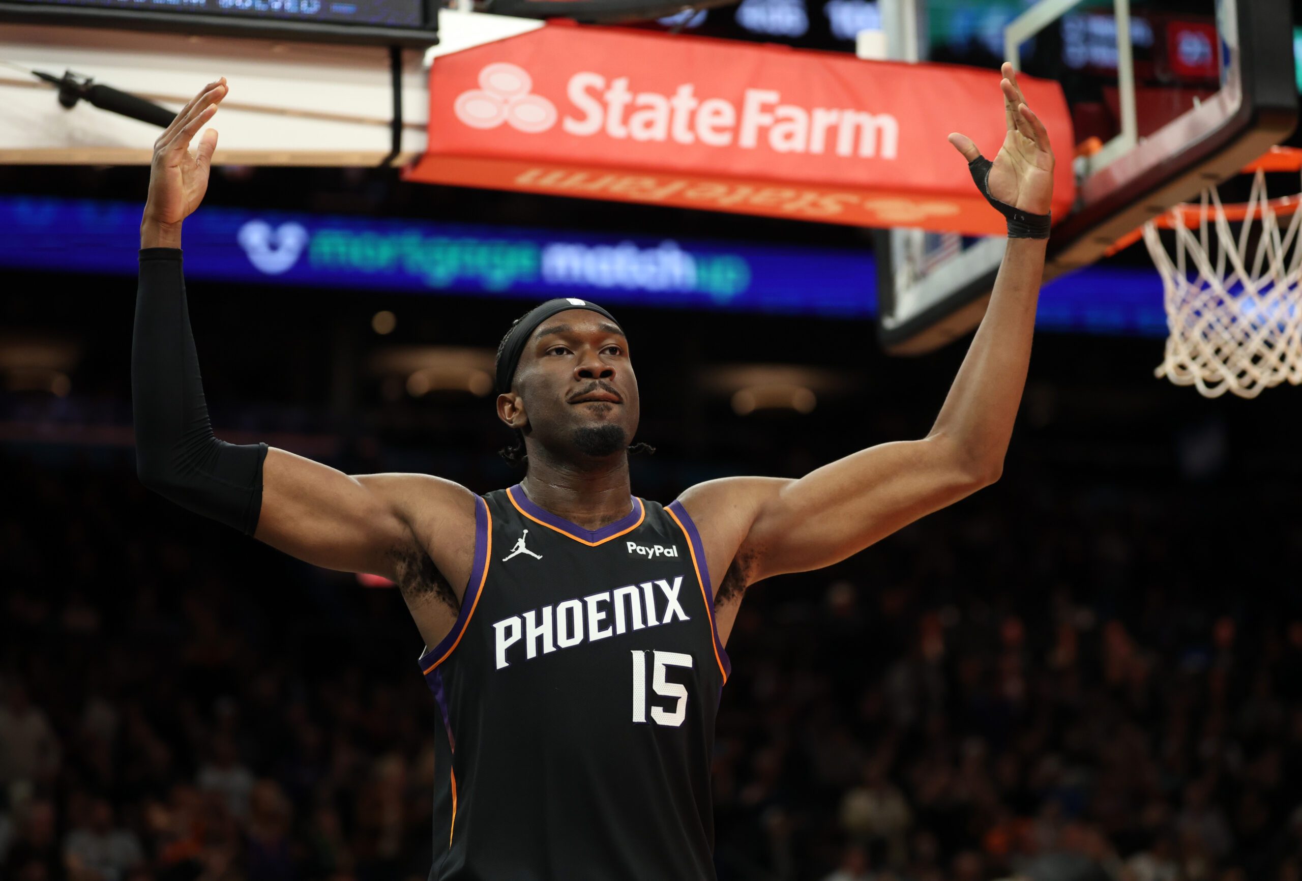 Nov 21, 2025; Phoenix, Arizona, USA; Phoenix Suns center Mark Williams (15) reacts against the Minnesota Timberwolves in the second half of an NBA Cup game at Mortgage Matchup Center. Mandatory Credit: Mark J. Rebilas-Imagn Images