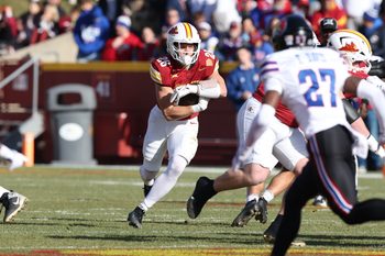 Nov 22, 2025; Ames, Iowa, USA; Iowa State Cyclones running back Carson Hansen (26) runs the football against the Kansas Jayhawks during the first half at Jack Trice Stadium. Mandatory Credit: Reese Strickland-Imagn Images