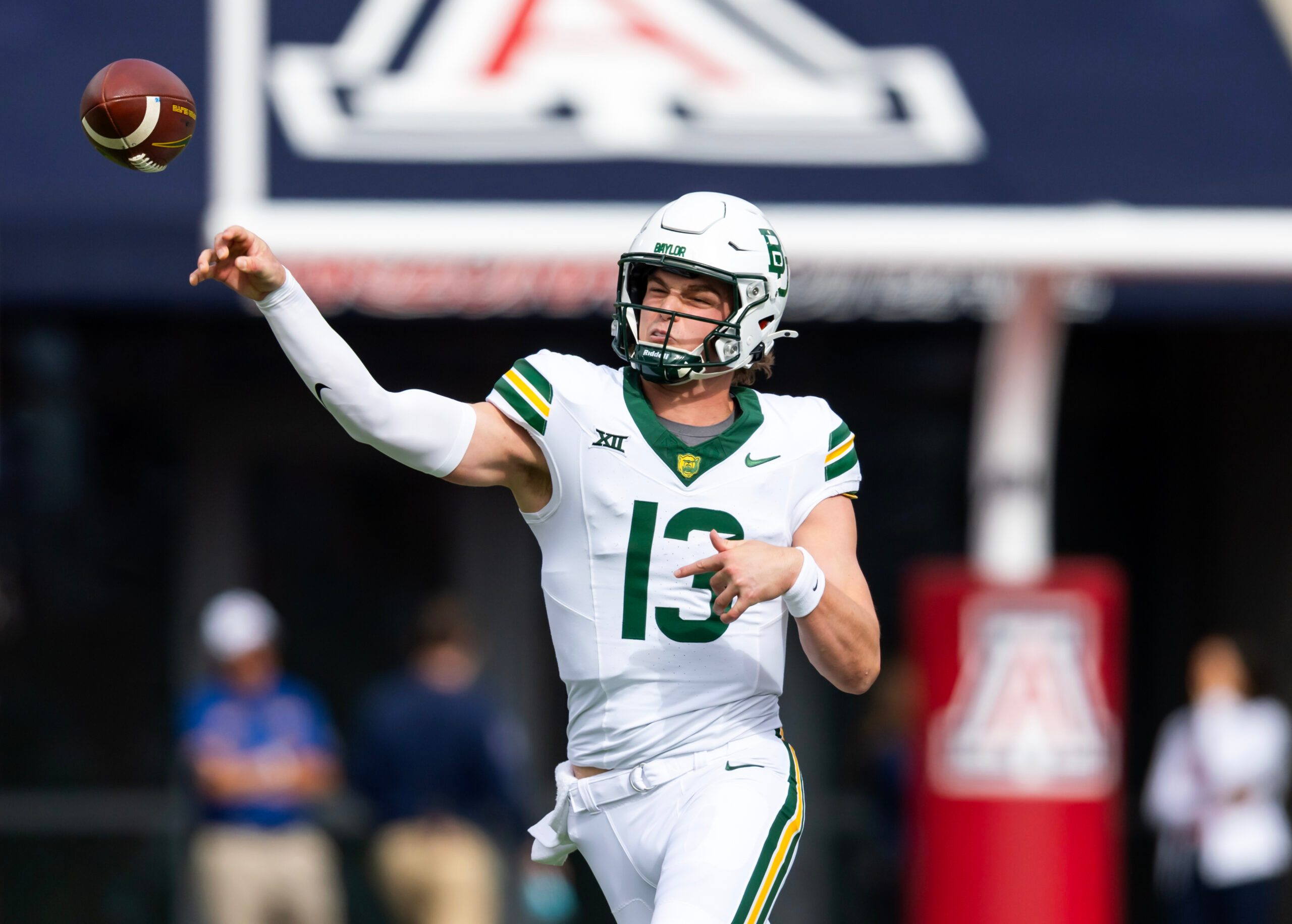 Nov 22, 2025; Tucson, Arizona, USA; Baylor Bears quarterback Sawyer Robertson (13) against the Arizona Wildcats in the first half at Casino Del Sol Stadium. Mandatory Credit: Mark J. Rebilas-Imagn Images