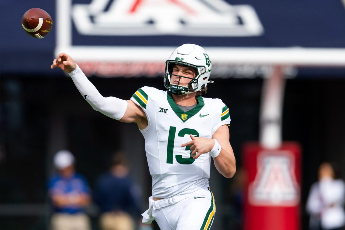 Nov 22, 2025; Tucson, Arizona, USA; Baylor Bears quarterback Sawyer Robertson (13) against the Arizona Wildcats in the first half at Casino Del Sol Stadium. Mandatory Credit: Mark J. Rebilas-Imagn Images