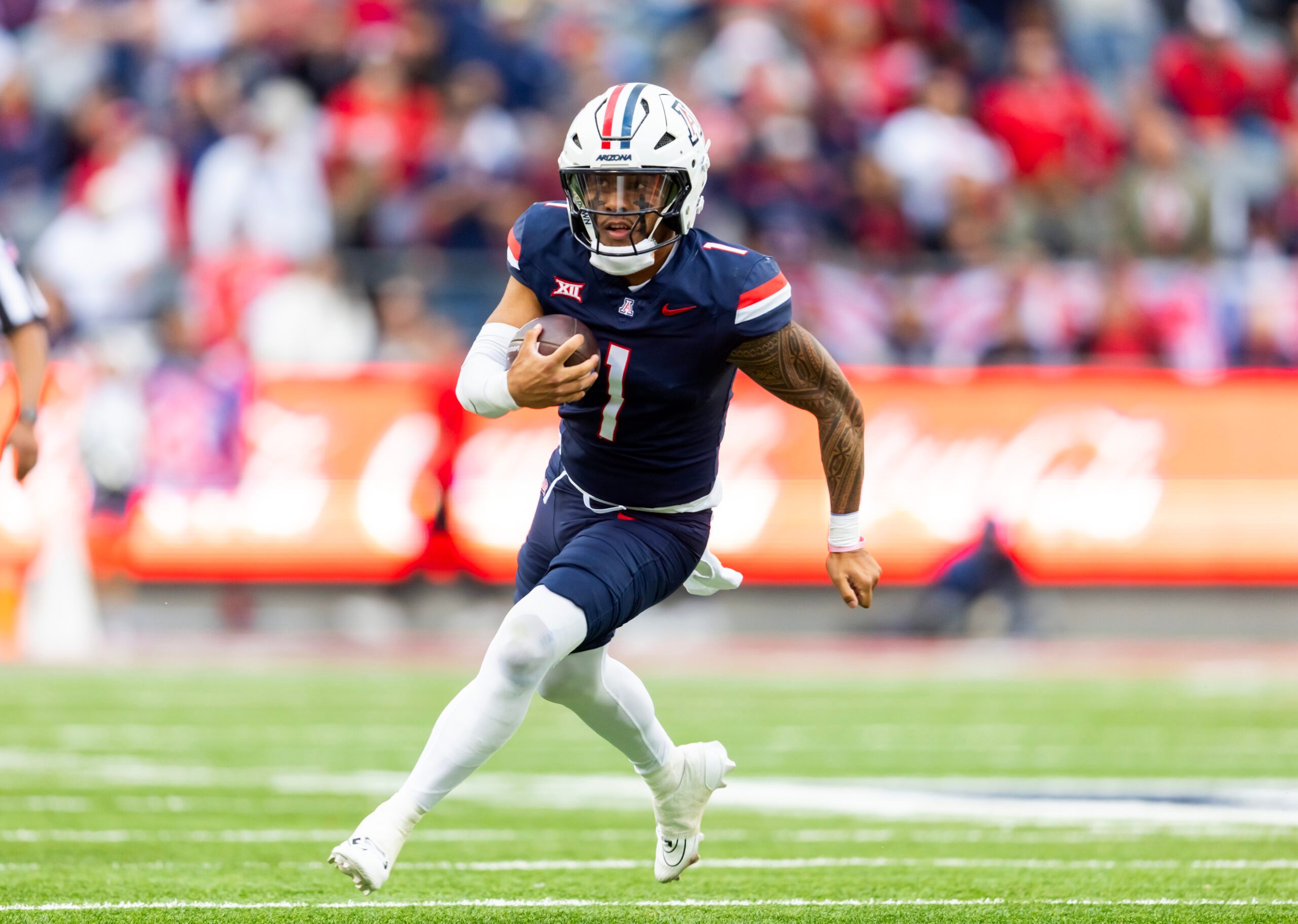 Nov 22, 2025; Tucson, Arizona, USA; Arizona Wildcats quarterback Noah Fifita (1) against the Baylor Bears in the second half at Casino Del Sol Stadium. Mandatory Credit: Mark J. Rebilas-Imagn Images