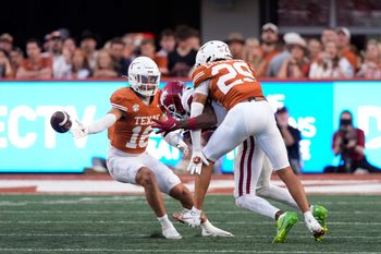 Nov 22, 2025; Austin, Texas, USA; Texas Longhorns defensive back Graceson Littleton (29) breaks up a pass ahead teammate Michael Taaffe (16) during the second half against the Arkansas Razorbacks at Darrell K Royal-Texas Memorial Stadium. Mandatory Credit: Scott Wachter-Imagn Images