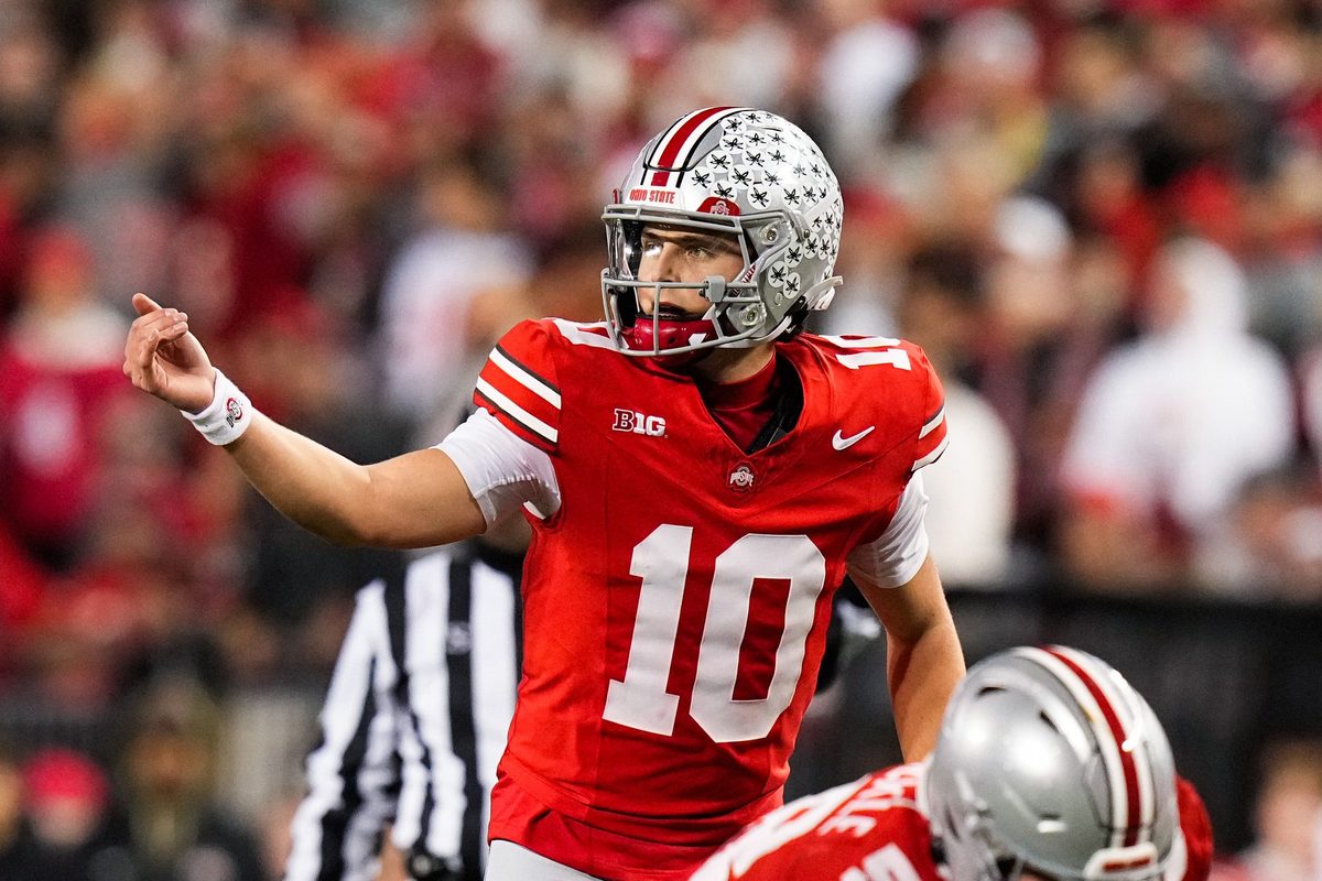 Ohio State Buckeyes quarterback Julian Sayin (10) speaks to his teammates in the second half of the NCAA college football game at Ohio Stadium on Saturday, Nov. 15, 2025 in Columbus, Ohio.