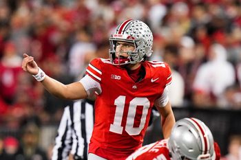 Ohio State Buckeyes quarterback Julian Sayin (10) speaks to his teammates in the second half of the NCAA college football game at Ohio Stadium on Saturday, Nov. 15, 2025 in Columbus, Ohio.
