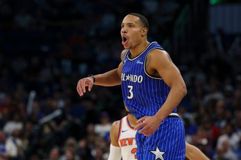 Nov 22, 2025; Orlando, Florida, USA; Orlando Magic guard Desmond Bane (3) reacts after a play against the New York Knicks in the third quarter at Kia Center. Mandatory Credit: Nathan Ray Seebeck-Imagn Images