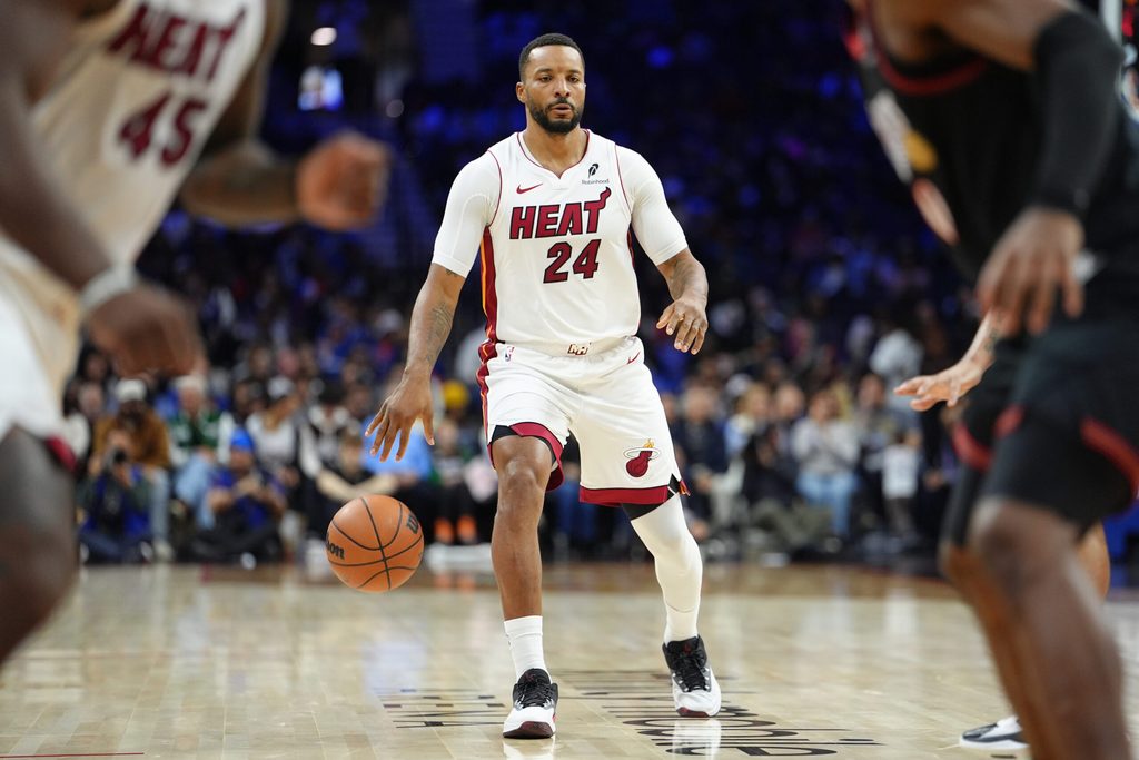 Nov 23, 2025; Philadelphia, Pennsylvania, USA; Miami Heat guard Norman Powell (24) controls the ball against the Philadelphia 76ers in the second quarter at Xfinity Mobile Arena. Mandatory Credit: Kyle Ross-Imagn Images