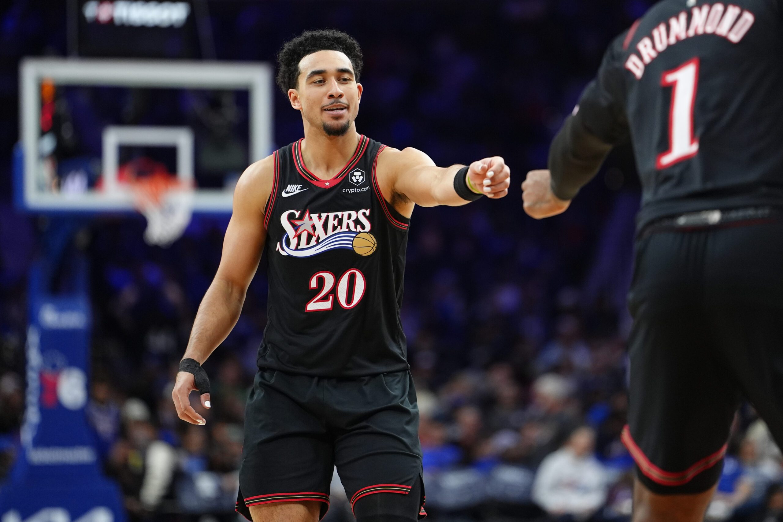 Nov 23, 2025; Philadelphia, Pennsylvania, USA; Philadelphia 76ers guard Jared McCain (20) reacts against the Miami Heat in the third quarter at Xfinity Mobile Arena. Mandatory Credit: Kyle Ross-Imagn Images