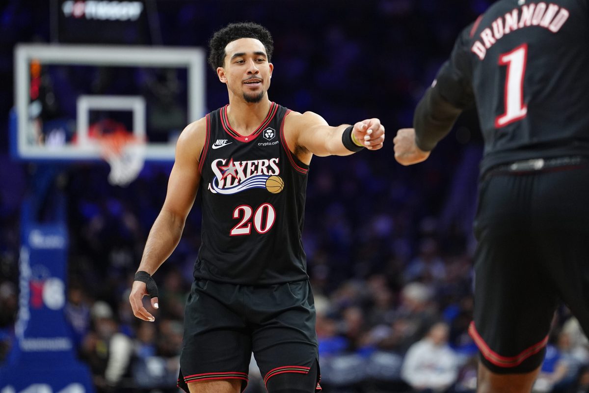 Nov 23, 2025; Philadelphia, Pennsylvania, USA; Philadelphia 76ers guard Jared McCain (20) reacts against the Miami Heat in the third quarter at Xfinity Mobile Arena. Mandatory Credit: Kyle Ross-Imagn Images