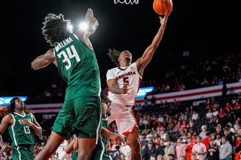 Nov 17, 2025; Athens, Georgia, USA; Georgia Bulldogs guard Jeremiah Wilkinson (5) shoots over Florida A&M Rattlers center Miles Ndalama (34) at Stegeman Coliseum. Mandatory Credit: Dale Zanine-Imagn Images