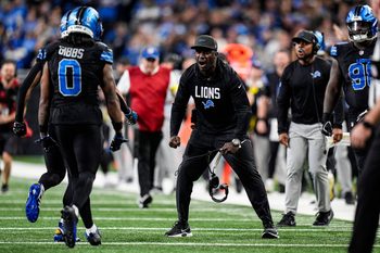 Detroit Lions assistant head coach and wide receivers coach Scottie Montgomery celebrates a touchdown scored by running back Jahmyr Gibbs against the New York Giants during overtime at Ford Field in Detroit on Sunday, Nov. 23, 2025.