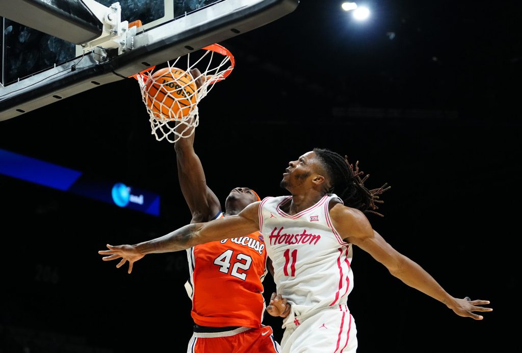 Nov 24, 2025; Las Vegas, Nevada, USA; Syracuse Orange forward William Kyle III (42) drives to the hoop past Houston Cougars forward Joseph Tugler (11) during the second half of a 2025 Players Era Festival group play game at MGM Grand Garden Arena. Mandatory Credit: Stephen R. Sylvanie-Imagn Images