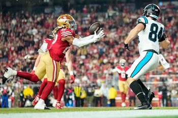 Nov 24, 2025; Santa Clara, California, USA; San Francisco 49ers safety Ji'Ayir Brown (27) makes an interception against the Carolina Panthers during the first half at Levi's Stadium. Mandatory Credit: Kyle Terada-Imagn Images