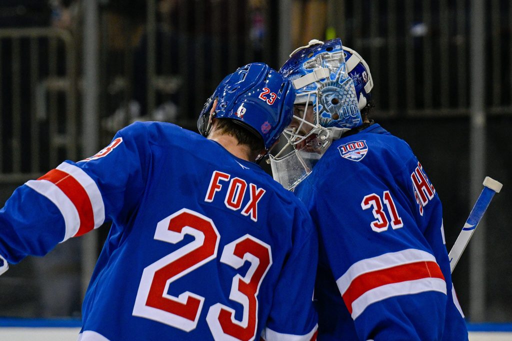 Nov 24, 2025; New York, New York, USA; New York Rangers defenseman Adam Fox (23) celebrates the 3-2 win against the St. Louis Blues with New York Rangers goaltender Igor Shesterkin (31) during the third period at Madison Square Garden. Mandatory Credit: Dennis Schneidler-Imagn Images