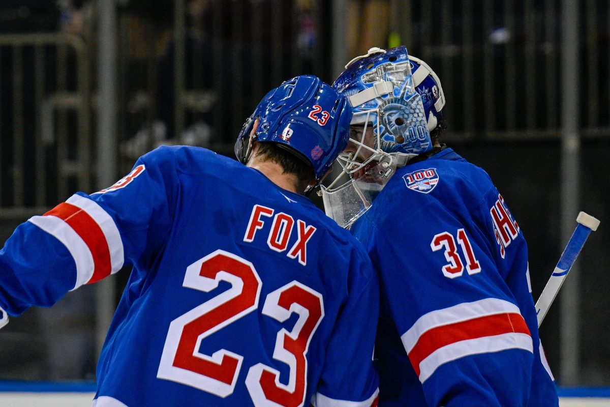 Nov 24, 2025; New York, New York, USA; New York Rangers defenseman Adam Fox (23) celebrates the 3-2 win against the St. Louis Blues with New York Rangers goaltender Igor Shesterkin (31) during the third period at Madison Square Garden. Mandatory Credit: Dennis Schneidler-Imagn Images