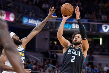 Nov 24, 2025; Indianapolis, Indiana, USA; Detroit Pistons guard Cade Cunningham (2) shoots the ball while Indiana Pacers forward Isaiah Jackson (22) defends in the second half at Gainbridge Fieldhouse. Mandatory Credit: Trevor Ruszkowski-Imagn Images