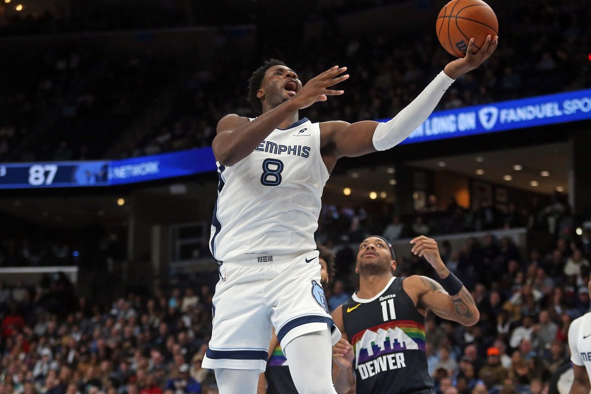 Nov 24, 2025; Memphis, Tennessee, USA; Memphis Grizzlies forward/center Jaren Jackson Jr. (8) shoots during the fourth quarter against the Denver Nuggets at FedExForum. Mandatory Credit: Petre Thomas-Imagn Images
