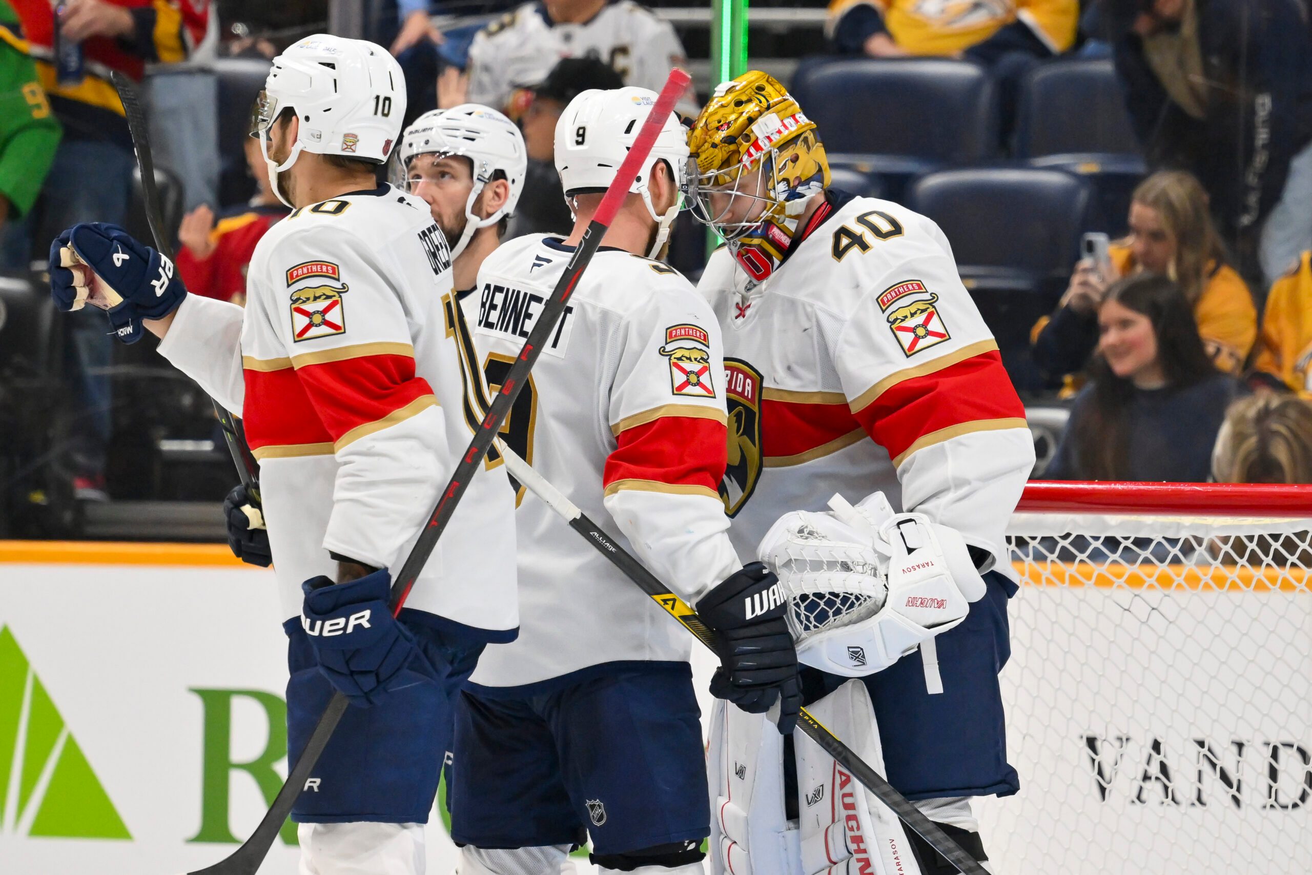 Nov 24, 2025; Nashville, Tennessee, USA;  Florida Panthers goaltender Daniil Tarasov (40) celebrates the win with his teammates against the Nashville Predators during the third period at Bridgestone Arena. Mandatory Credit: Steve Roberts-Imagn Images