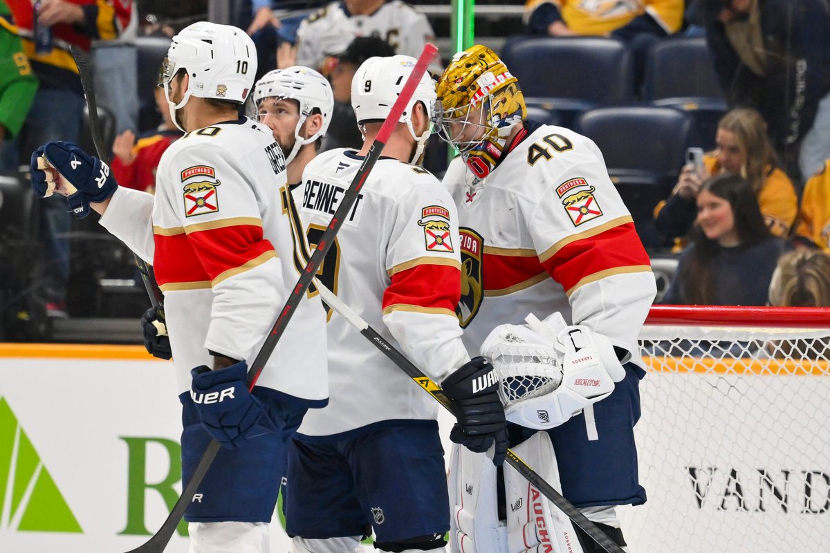 Nov 24, 2025; Nashville, Tennessee, USA; Florida Panthers goaltender Daniil Tarasov (40) celebrates the win with his teammates against the Nashville Predators during the third period at Bridgestone Arena. Mandatory Credit: Steve Roberts-Imagn Images