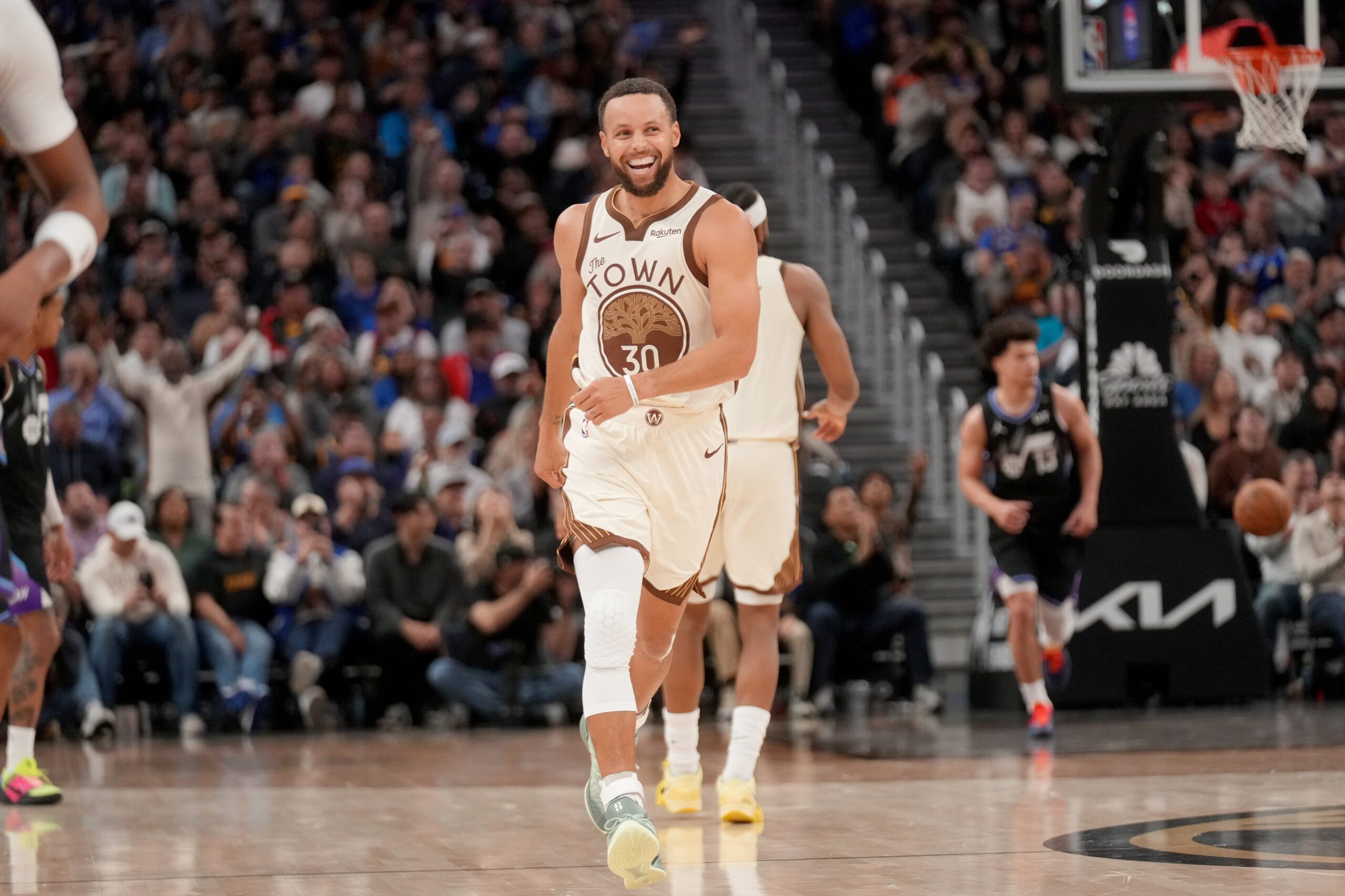 Nov 24, 2025; San Francisco, California, USA; Golden State Warriors guard Stephen Curry (30) reacts after making a three point basket against the Utah Jazz in the fourth quarter at the Chase Center. Mandatory Credit: Cary Edmondson-Imagn Images