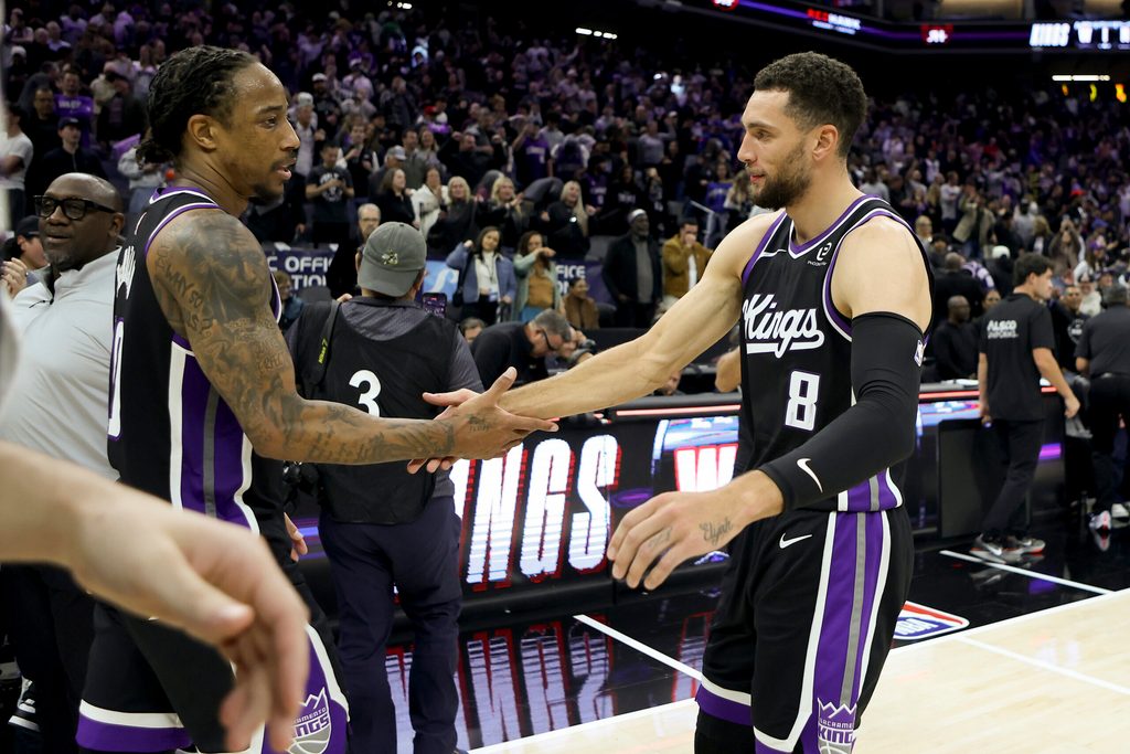 Nov 24, 2025; Sacramento, California, USA; Sacramento Kings forward DeMar DeRozan (10) and guard Zach LaVine (8) celebrate at mid court after defeating the Minnesota Timberwolves at Golden 1 Center. Mandatory Credit: Dennis Lee-Imagn Images