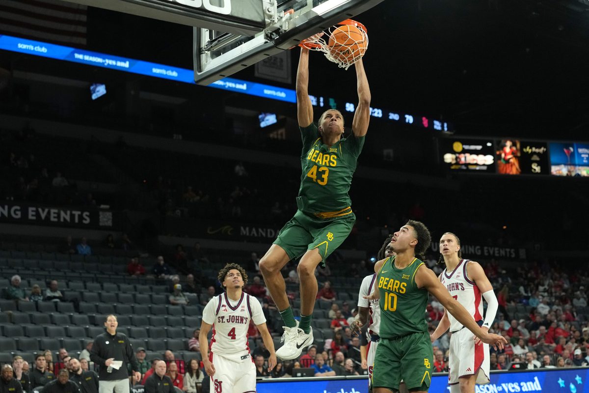 Nov 25, 2025; Las Vegas, Nevada, USA; Baylor Bears guard Cameron Carr (43) dunks the ball during the second half of a 2025 Players Era Festival group play game against the St. John's Red Storm at Michelob Ultra Arena. Mandatory Credit: Kirby Lee-Imagn Images