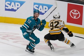 Nov 23, 2025; San Jose, California, USA;  San Jose Sharks left wing William Eklund (72) and Boston Bruins center Marat Khusnutdinov (92) pursue the puck in the third period at SAP Center in San Jose. Mandatory Credit: David Gonzales-Imagn Images