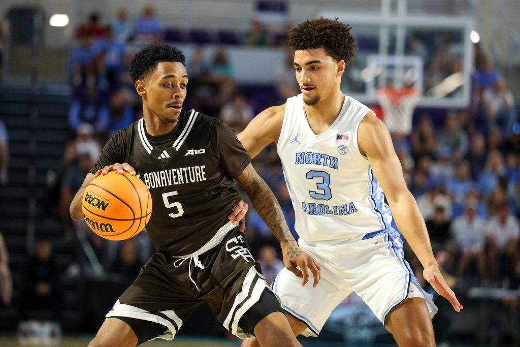 Nov 25, 2025; Fort Myers, Florida, USA; St. Bonaventure Bonnies guard Dasonte Bowen (5) is guarded by North Carolina Tar Heels guard Derek Dixon (3) in the second half at Suncoast Credit Union Arena. Mandatory Credit: Nathan Ray Seebeck-Imagn Images