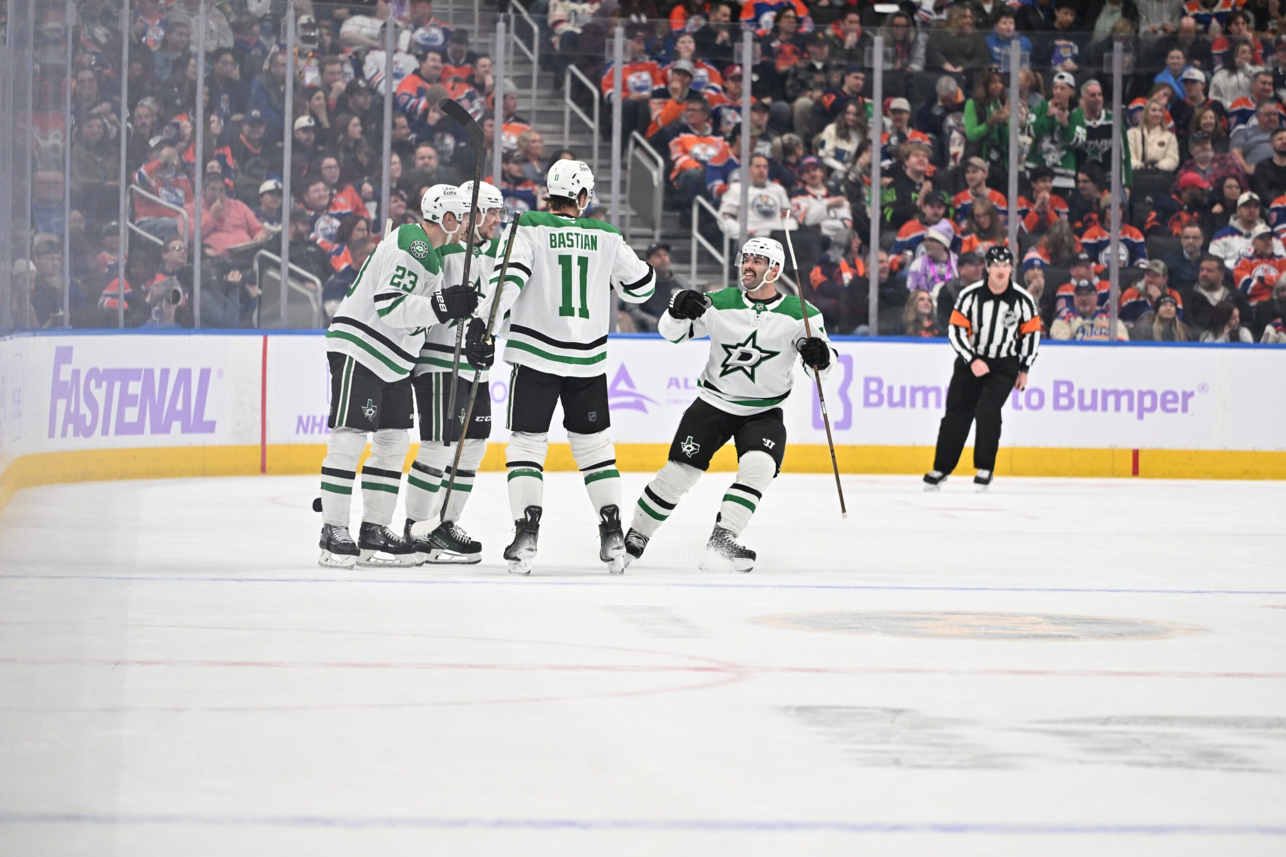 Nov 25, 2025; Edmonton, Alberta, CAN;  Dallas Stars (defenceman Esa Lindell 23) with Stars defencemanb Miro Heiskanen (4) Stars centre Colin Blackwell (15) and Stars right winger Nathan Bastian (11) celebrate a goal during the first period at Rogers Place. Mandatory Credit: Walter Tychnowicz-Imagn Images