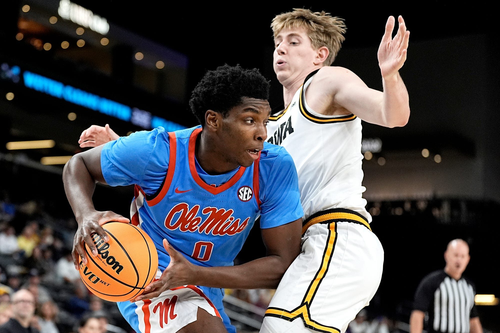 Mississippi forward Malik Dia (0) drives to the basket during the first half of the game against Iowa at Acrisure Arena in Palm Desert, Calif., on Nov. 25, 2025.