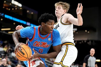 Mississippi forward Malik Dia (0) drives to the basket during the first half of the game against Iowa at Acrisure Arena in Palm Desert, Calif., on Nov. 25, 2025.