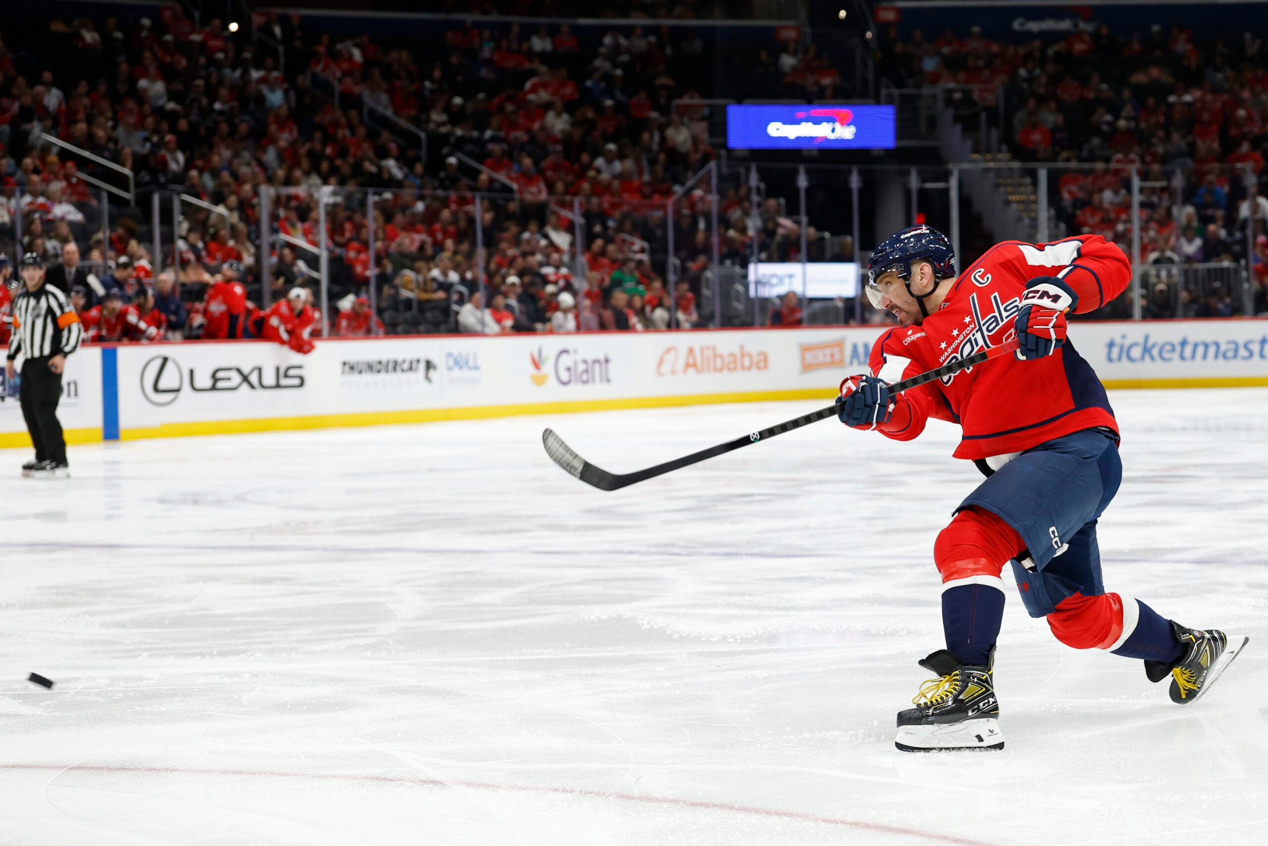 Nov 26, 2025; Washington, District of Columbia, USA; Washington Capitals left wing Alex Ovechkin (8) shoots the puck against the Winnipeg Jets during the third period at Capital One Arena. Mandatory Credit: Geoff Burke-Imagn Images