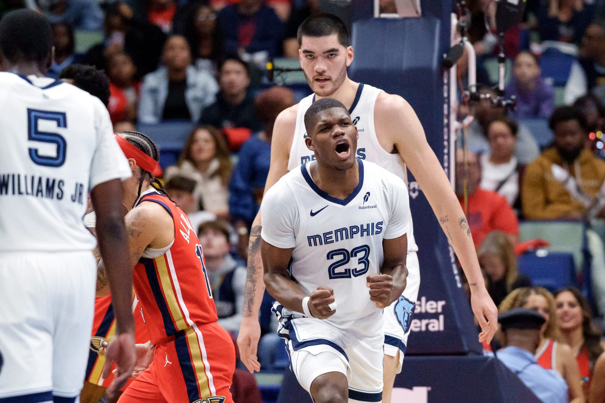Nov 26, 2025; New Orleans, Louisiana, USA; Memphis Grizzlies forward Cedric Coward (23) reacts after drawing a foul in overtime against the New Orleans Pelicans at Smoothie King Center. Mandatory Credit: Matthew Hinton-Imagn Images