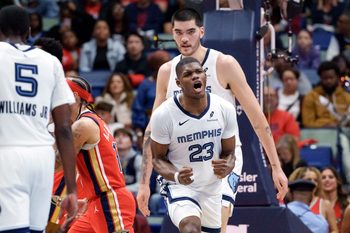 Nov 26, 2025; New Orleans, Louisiana, USA; Memphis Grizzlies forward Cedric Coward (23) reacts after drawing a foul in overtime against the New Orleans Pelicans at Smoothie King Center. Mandatory Credit: Matthew Hinton-Imagn Images