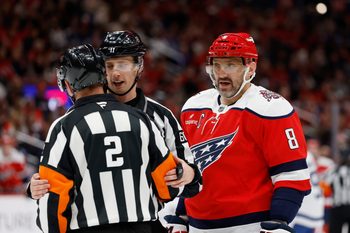 Nov 28, 2025; Washington, District of Columbia, USA; Washington Capitals left wing Alex Ovechkin (8) argues with referee Jon McIsaac (2) during a timeout against the Toronto Maple Leafs during the second period at Capital One Arena. Mandatory Credit: Geoff Burke-Imagn Images