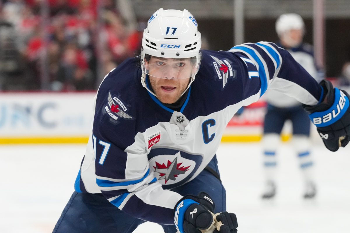 Nov 28, 2025; Raleigh, North Carolina, USA; Winnipeg Jets center Adam Lowry (17) skates against the Carolina Hurricanes during the second period at Lenovo Center. Mandatory Credit: James Guillory-Imagn Images