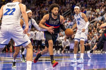 Nov 28, 2025; Detroit, Michigan, USA; Detroit Pistons guard Cade Cunningham (2) moves the ball up court against the Orlando Magic in the second half of the annual in-season NBA Cup tournament at Little Caesars Arena. Mandatory Credit: David Reginek-Imagn Images