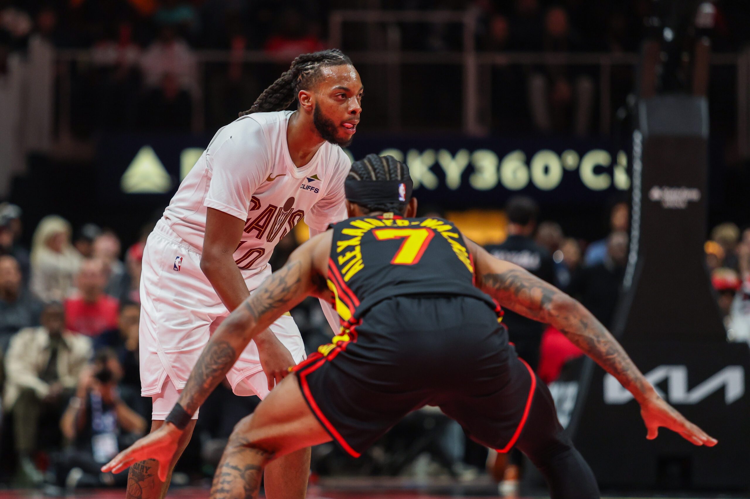 Nov 28, 2025; Atlanta, Georgia, USA; Cleveland Cavaliers guard Darius Garland (10) looks for the play against Atlanta Hawks guard Nickeil Alexander-Walker (7) during the fourth quarter at State Farm Arena. Mandatory Credit: Jordan Godfree-Imagn Images